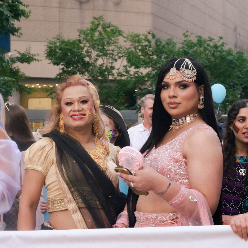 Two trans women wearing saris at Toronto's Trans March